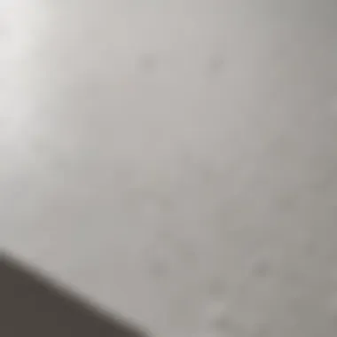 White glossy spray paint on textured surface