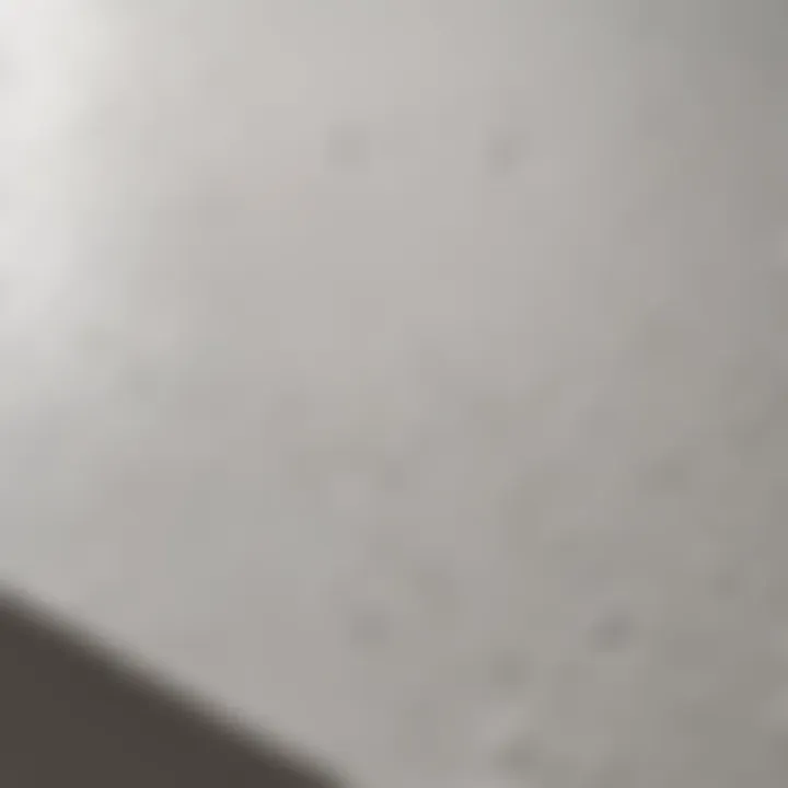 White glossy spray paint on textured surface